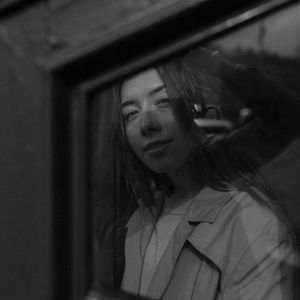 Silhouette of a person standing in a balanced pose.